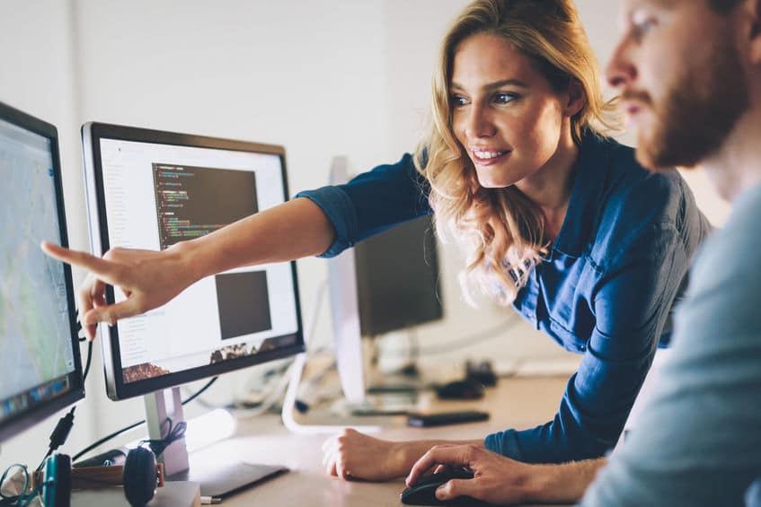 Software engineers working on project and programming in company About Ethervision
